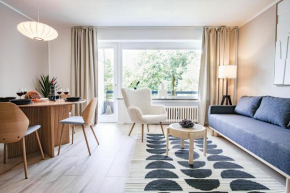 HOMEFY FEEL-GOOD APARTMENT - own parking, balcony and garden